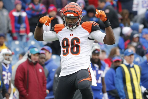 Cincinnati Bengals defensive end Carlos Dunlap (96) celebrate his sack of Buffalo Bills quarterback EJ Manuel during the second half of an NFL football game on Sunday, Oct. 18, 2015, in Orchard Park, N.Y. Cincinnati won 34-21. (AP Photo/Bill Wippert)