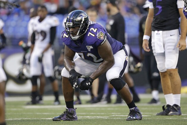 Baltimore Ravens guard Kelechi Osemele lines up for a play during NFL football training camp, Monday, Aug. 3, 2015, in Baltimore. (AP Photo/Patrick Semansky)
