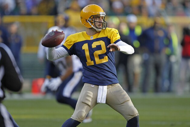 Green Bay Packers quarterback Aaron Rodgers passes against the San Diego Chargers during an NFL football game Sunday Oct. 18, 2015, in Green Bay, Wis. (AP Photo/Matt Ludtke)