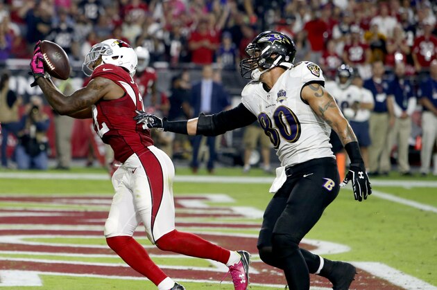 Arizona Cardinals strong safety Tony Jefferson (22) intercepts a  throw intended for Baltimore Ravens tight end Crockett Gillmore (80) in the end zone during the final seconds the second half of an NFL football game, Monday, Oct. 26, 2015, in Glendale, Ariz. The Cardinals won 26-18. (AP Photo/Rick Scuteri)