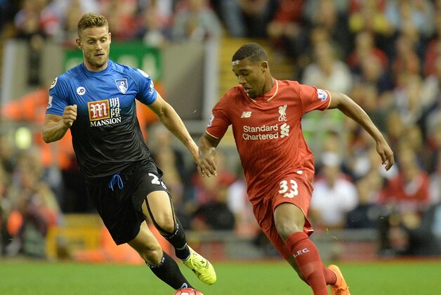 Liverpool's English midfielder Jordon Ibe (R) in action during the English Premier League football match between Liverpool and Bournemouth at the Anfield stadium in Liverpool, north-west England on August 17, 2015. AFP PHOTO / OLI SCARFF

RESTRICTED TO EDITORIAL USE. No use with unauthorized audio, video, data, fixture lists, club/league logos or 'live' services. Online in-match use limited to 75 images, no video emulation. No use in betting, games or single club/league/player publications.        (Photo credit should read OLI SCARFF/AFP/Getty Images)