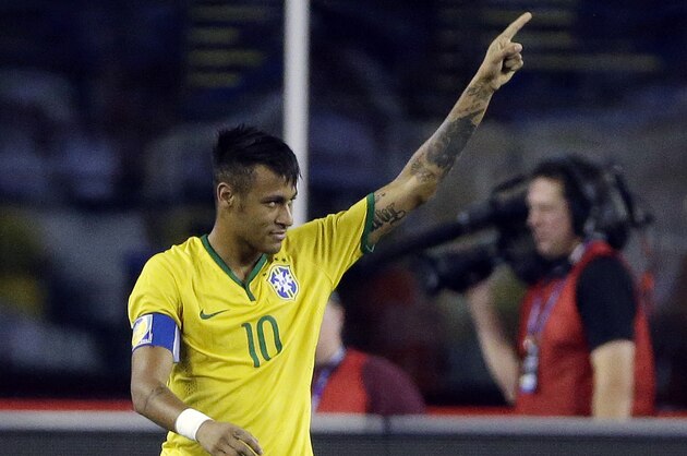 Brazil's Neymar celebrates his goal on a penalty kick against the United States during the second half of a friendly soccer match Tuesday, Sept. 8, 2015, in Foxborough, Mass. (AP Photo/Stephan Savoia)