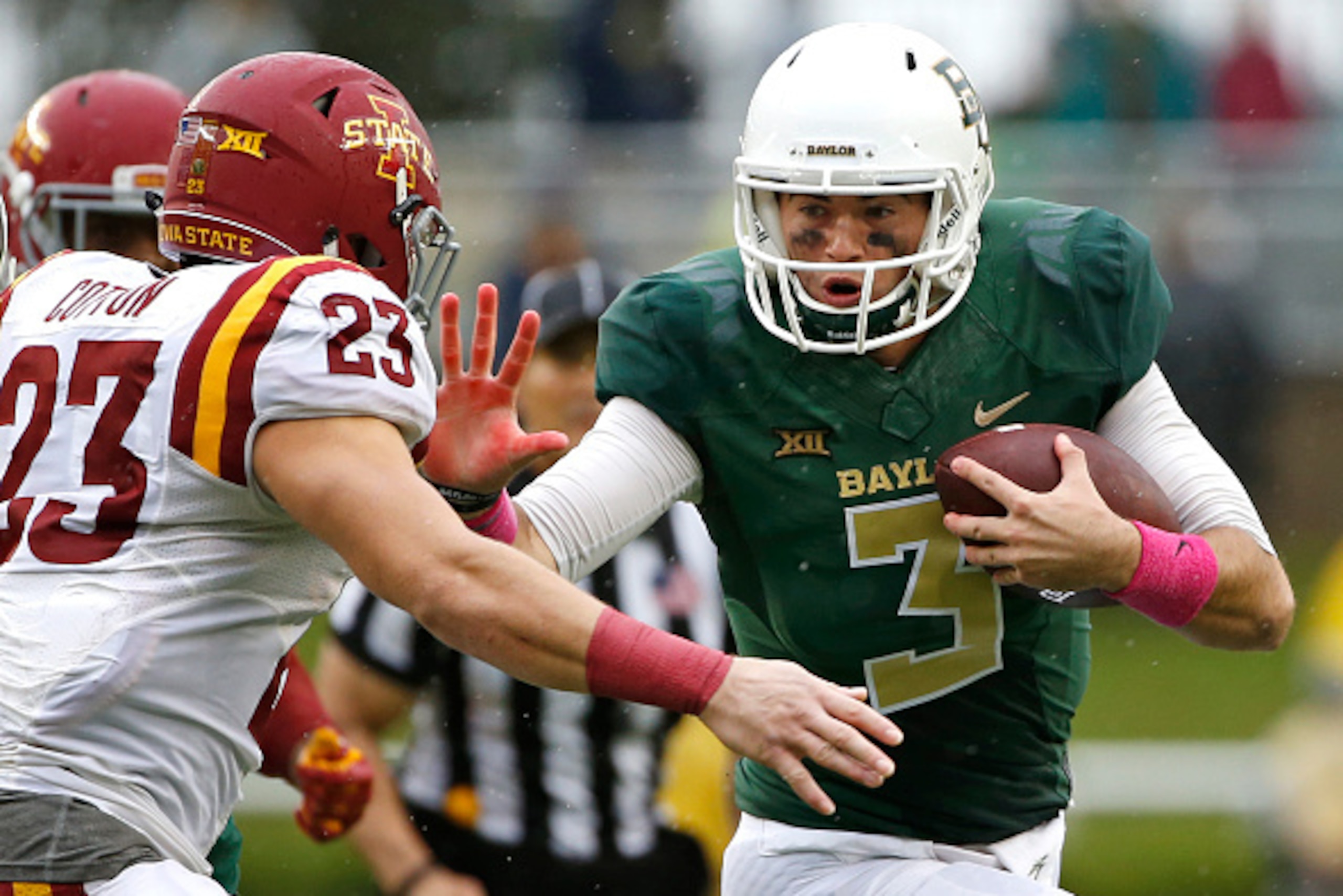 WACO, TX - OCTOBER 24: Jarrett Stidham #3 of the Baylor Bears runs against Darian Cotton #23 of the Iowa State Cyclones in the second half at McLane Stadium on October 24, 2015 in Waco, Texas. (Photo by Ron Jenkins/Getty Images)