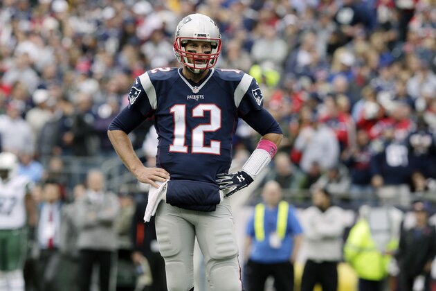 New England Patriots quarterback Tom Brady stands on the field during the first half of an NFL football game against the New York Jets, Sunday, Oct. 25, 2015, in Foxborough, Mass. (AP Photo/Charles Krupa)