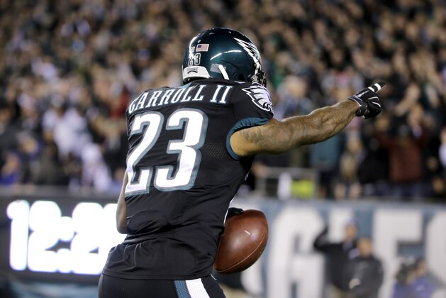 Philadelphia Eagles cornerback Nolan Carroll runs with the ball after intercepting a pass from New York Giants quarterback Eli Manning during the first half of an NFL football game, Monday, Oct. 19, 2015, in Philadelphia. (AP Photo/Matt Rourke)