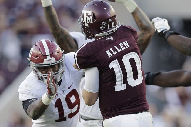 Alabama linebacker Reggie Ragland (19) pressures Texas A&M quarterback Kyle Allen (10) during the second half of an NCAA college football game, Saturday, Oct. 17, 2015, in College Station, Texas. Alabama won 41-23. (AP Photo/Eric Gay)