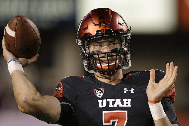 Utah quarterback Travis Wilson passes the ball during practice before the start of their NCAA college football game against Arizona State Saturday, Oct. 17, 2015, in Salt Lake City. (AP Photo/Rick Bowmer)