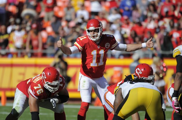 Kansas City Chiefs quarterback Alex Smith (11) calls a play at the line of scrimmage during the second half of an NFL football game against the Pittsburgh Steelers in Kansas City, Mo., Sunday, Oct. 25, 2015. The Kansas City Chiefs won 23-13. (AP Photo/Ed Zurga)