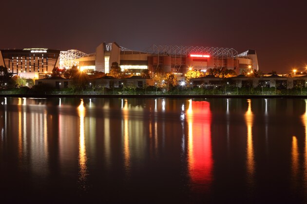 MANCHESTER, ENGLAND - OCTOBER 25:  A general view of Old Trafford Stadium the home of Manchester United on the banks of Salford Quay after the Barclays Premier League match between Manchester United and Manchester City at Old Trafford on October 25, 2015 in Manchester, England.  (Photo by Matthew Ashton - AMA/Getty Images)
