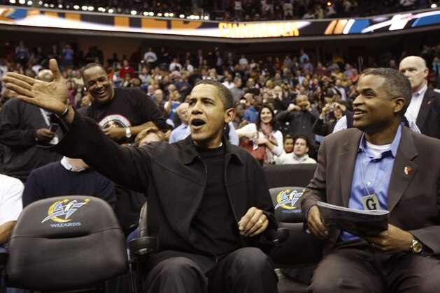 ** ADVANCE FOR TUESDAY, FEB. 23 AND THEREAFTER - EMBARGOED UNTIL 12;:01 A.M., TUESDAY, FEB. 23 ** FILE - In this Friday, Feb. 27, 2009, file photo President Barack Obama attends the Washington Wizards NBA basketball game against the Chicago Bulls at the Verizon Center  in Washington. Marty Nesbitt, right, is a friend from Chicago. Even a president needs to have a BFF or two. Meet Chicago businessman Marty Nesbitt and hospital executive Eric Whitaker. There's a good chance you may already have seen them. They're regulars at President Barack Obama's side: tagging along when he accepted the Nobel Peace Prize in Norway, buying shave ice during the president's Hawaii vacation, shooting hoops in D.C., climbing a lighthouse on Martha's Vineyard and attending A-list White House parties. (AP Photo/Gerald Herbert, File)