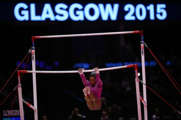GLASGOW, SCOTLAND - OCTOBER 24:  Simone Biles of United States competes on the Uneven Bars during day Two of the 2015 World Artistic Gymnastics Championships at The SSE Hydro on October 24, 2015 in Glasgow, Scotland. (Photo by Ian MacNicol/Getty images)