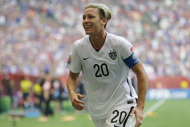 United States forward Abby Wambach reacts after the U.S. beat Japan 5-2 in the FIFA Women's World Cup soccer championship in Vancouver, British Columbia, Canada, Sunday, July 5, 2015. (AP Photo/Elaine Thompson)