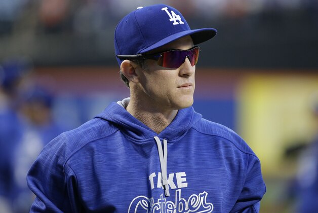 Los Angeles Dodgers' Chase Utley walks onto the field for batting practice before the start of baseball's Game 4 of the National League Division Series against the New York Mets, Tuesday, Oct. 13, 2015, in New York. (AP Photo/Frank Franklin II)