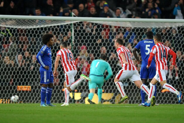 Stoke’s Jonathan Walters, second right, celebrates after scoring during the English League Cup Fourth Round soccer match between Stoke City and Chelsea at the Britannia Stadium, Stoke on Trent, England, Tuesday, Oct. 27, 2015. (AP Photo/Rui Vieira)