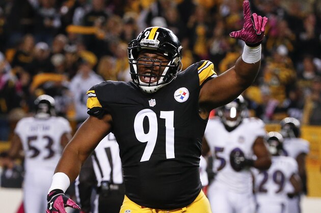 Pittsburgh Steelers defensive end Stephon Tuitt (91) celebrates after sacking Baltimore Ravens quarterback Joe Flacco (5) in the first quarter of an NFL football game ,Thursday, Oct. 1, 2015 in Pittsburgh. (AP Photo/Gene J. Puskar)