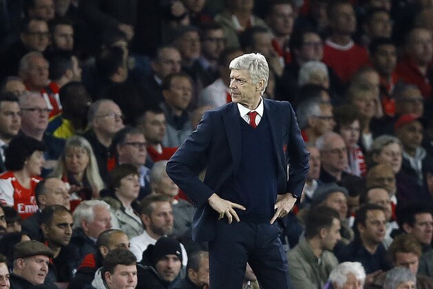 Arsenal's manager Arsene Wenger looks on during the Champions League Group F soccer match between Arsenal and Bayern Munich at Emirates stadium in London Tuesday, Oct. 20, 2015. (AP Photo/Kirsty Wigglesworth)