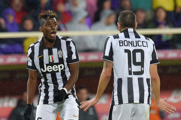 FLORENCE, ITALY - DECEMBER 05: Paul Pogba and Leonardo Bonucci of Juventus FC during the Serie A match between ACF Fiorentina and Juventus FC at Stadio Artemio Franchi on December 5, 2014 in Florence, Italy. (Photo by Giuseppe Bellini/Getty Images)