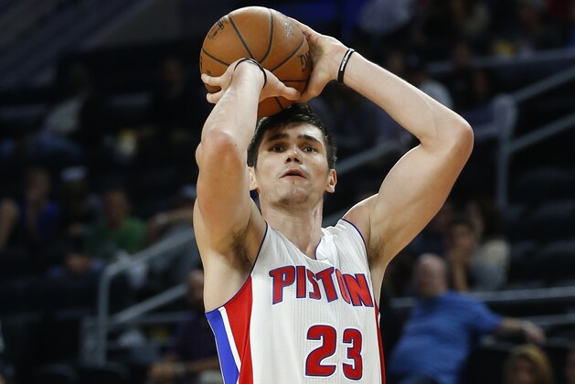 Detroit Pistons forward Ersan Ilyasova (23) shoots against the Brooklyn Nets in the second half of an NBA preseason basketball game in Auburn Hills, Mich., Thursday, Oct. 8, 2015. (AP Photo/Paul Sancya)