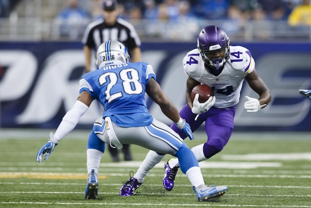Minnesota Vikings wide receiver Stefon Diggs (14) rushes at Detroit Lions cornerback Quandre Diggs (28) during an NFL football game, Sunday, Oct. 25, 2015, in Detroit. (AP Photo/Rick Osentoski)