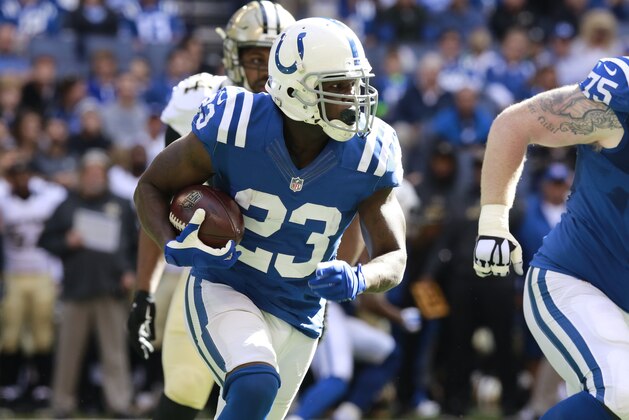 Indianapolis Colts running back Frank Gore (23) runs against the New Orleans Saints  in the first half of an NFL football game in Indianapolis, Sunday, Oct. 25, 2015.  (AP Photo/R Brent Smith)