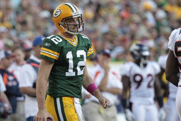Green Bay Packers quarterback Aaron Rodgers (12) during the second half of an NFL football game against the Denver Broncos Sunday, Oct. 2, 2011, in Green Bay, Wis. (AP Photo/Mike Roemer)