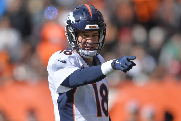 Denver Broncos quarterback Peyton Manning calls a play during an NFL football game against the Cleveland Browns, Sunday, Oct. 18, 2015, in Cleveland. Denver won 26-23 in overtime. (AP Photo/David Richard)