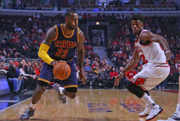 Oct 27, 2015; Chicago, IL, USA; Cleveland Cavaliers forward LeBron James (23) drives past Chicago Bulls guard Jimmy Butler (21) during the first half at the United Center. Mandatory Credit: Dennis Wierzbicki-USA TODAY Sports