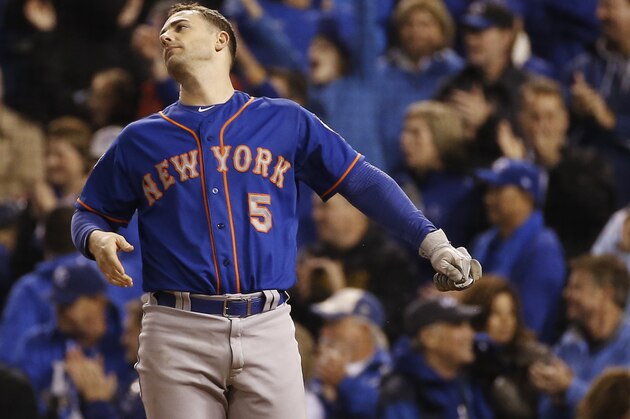 New York Mets' David Wright reacts after striking out with two men on base during the eleventh inning of Game 1 of the Major League Baseball World Series against the Kansas City Royals Tuesday, Oct. 27, 2015, in Kansas City, Mo. (AP Photo/Matt Slocum)