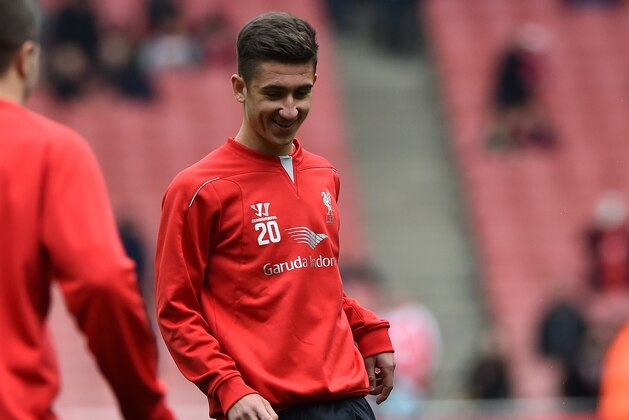 Liverpool's English midfielder Cameron Brannagan warms up ahead of the English Premier League football match between Arsenal and Liverpool at the Emirates Stadium in London on April 4, 2015. AFP PHOTO / BEN STANSALL

RESTRICTED TO EDITORIAL USE. NO USE WITH UNAUTHORIZED AUDIO, VIDEO, DATA, FIXTURE LISTS, CLUB/LEAGUE LOGOS OR LIVE SERVICES. ONLINE IN-MATCH USE LIMITED TO 45 IMAGES, NO VIDEO EMULATION. NO USE IN BETTING, GAMES OR SINGLE CLUB/LEAGUE/PLAYER PUBLICATIONS.        (Photo credit should read BEN STANSALL/AFP/Getty Images)