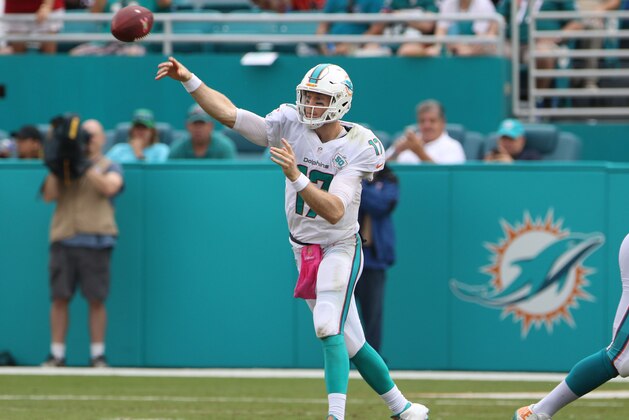 Ryan Tannehill throws a pass during an NFL football game between the Houston Texans and the Miami Dolphins, Sunday, Oct. 25, 2015, in Miami, FL. (Photo by Marc Serota/Panini)