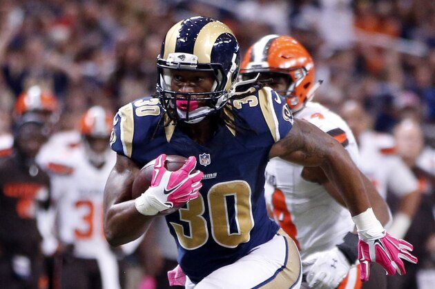 St. Louis Rams running back Todd Gurley heads for the end zone on a 16-yard touchdown run during the fourth quarter of an NFL football game against the Cleveland Browns Sunday, Oct. 25, 2015, in St. Louis. (AP Photo/Billy Hurst)
