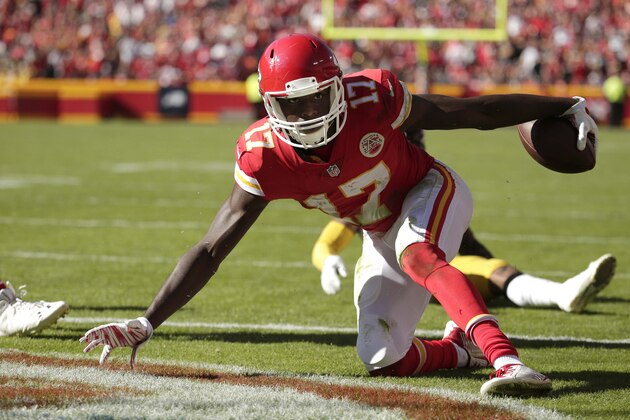 Kansas City Chiefs wide receiver Chris Conley (17) gets up after scoring a touchdown against Pittsburgh Steelers cornerback Antwon Blake (41) during the second half of an NFL football game in Kansas City, Mo., Sunday, Oct. 25, 2015. (AP Photo/Charlie Riedel)