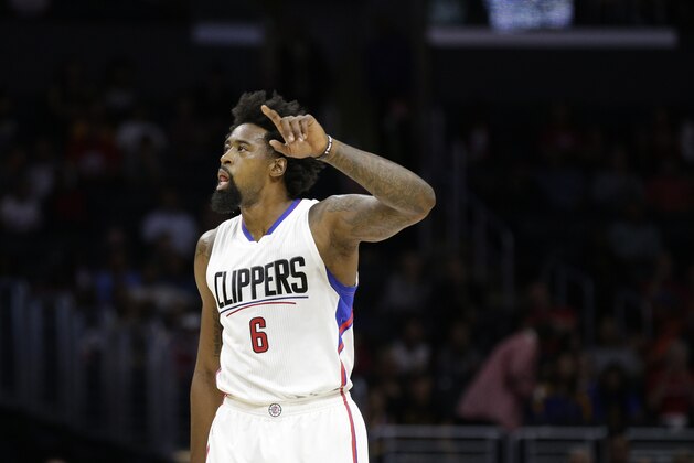 Los Angeles Clippers' DeAndre Jordan walks on the court during the first half of an NBA preseason basketball game against the Golden State Warriors, Tuesday, Oct. 20, 2015, in Los Angeles. (AP Photo/Jae C. Hong)