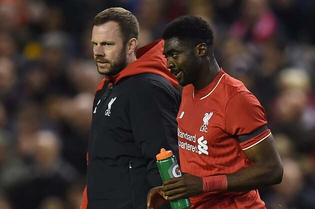 Liverpool's Ivorian defender Kolo Toure (R) is escorted off the putch injured during the English League Cup fourth round football match between Liverpool and Bournemouth at Anfield stadium in Liverpool, north west England on October 28, 2015. AFP PHOTO / PAUL ELLIS

RESTRICTED TO EDITORIAL USE. NO USE WITH UNAUTHORIZED AUDIO, VIDEO, DATA, FIXTURE LISTS, CLUB/LEAGUE LOGOS OR 'LIVE' SERVICES. ONLINE IN-MATCH USE LIMITED TO 75 IMAGES, NO VIDEO EMULATION. NO USE IN BETTING, GAMES OR SINGLE CLUB/LEAGUE/PLAYER PUBLICATIONS.        (Photo credit should read PAUL ELLIS/AFP/Getty Images)