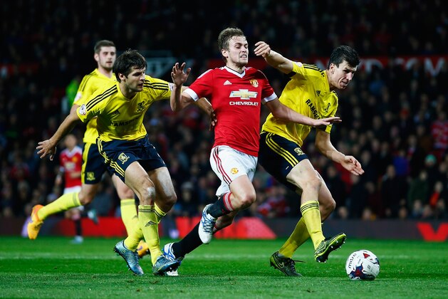 MANCHESTER, ENGLAND - OCTOBER 28: James Wilson of Manchester United takes on George Friend (L) and Daniel Ayala of Middlesbrough during the Capital One Cup Fourth Round match between Manchester United and Middlesbrough at Old Trafford on October 28, 2015 in Manchester, England. (Photo by Shaun Botterill/Getty Images) MANCHESTER, ENGLAND - OCTOBER 28: James Wilson of Manchester United takes on George Friend (L) and Daniel Ayala of Middlesbrough during the Capital One Cup Fourth Round match between Manchester United and Middlesbrough at Old Trafford on October 28, 2015 in Manchester, England. (Photo by Shaun Botterill/Getty Images)