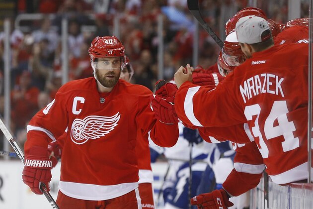 Detroit Red Wings left wing Henrik Zetterberg (40) celebrates his goal against the Tampa Bay Lightning in the third period of an NHL hockey game in Detroit Tuesday, Oct. 13, 2015. (AP Photo/Paul Sancya)