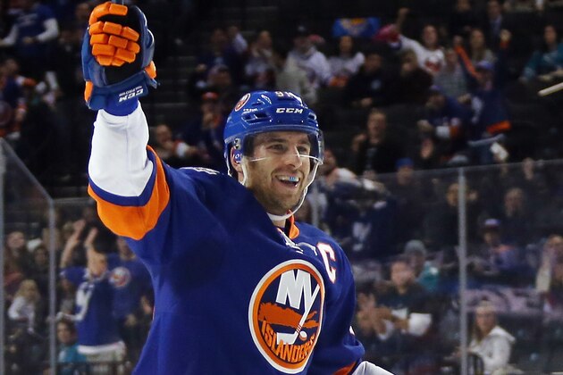 NEW YORK, NY - OCTOBER 17: John Tavares #91 of the New York Islanders celebrates a goal by Johnny Boychuk #55 (not shown) against the San Jose Sharks at 21 seconds of the second period at the Barclays Center on October 17, 2015 in the Brooklyn borough of New York City.  (Photo by Bruce Bennett/Getty Images)