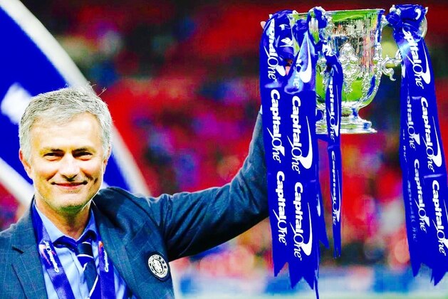LONDON, ENGLAND - MARCH 01:  Jose Mourinho of Chelsea celebrates with the trophy after winning the Capital One Cup Final match between Chelsea and Tottenham Hotspur at Wembley Stadium on March 1, 2015 in London, England.  (Photo by Clive Mason/Getty Images)