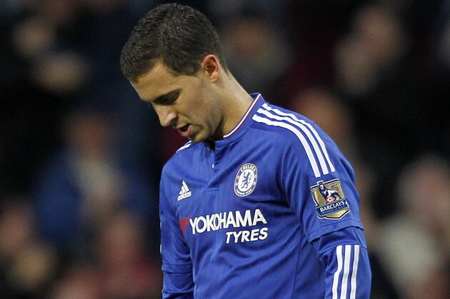 Chelsea's Belgian midfielder Eden Hazard reacts after West Ham United's English striker Andy Carroll scored his team's second goal during the English Premier League football match between West Ham United and Chelsea at The Boleyn Ground in Upton Park, east London on October 24, 2015. AFP PHOTO / IAN KINGTON

RESTRICTED TO EDITORIAL USE. No use with unauthorized audio, video, data, fixture lists, club/league logos or 'live' services. Online in-match use limited to 75 images, no video emulation. No use in betting, games or single club/league/player publications.        (Photo credit should read IAN KINGTON/AFP/Getty Images)