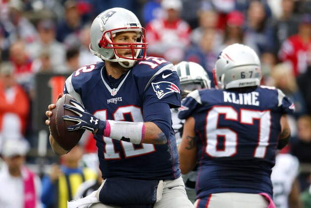 New England Patriots quarterback Tom Brady drops back against the New York Jets during a NFL football game at Gillette Stadium in Foxborough, Mass. Sunday, Oct. 25, 2015. (Winslow Townson/AP Images for Panini)