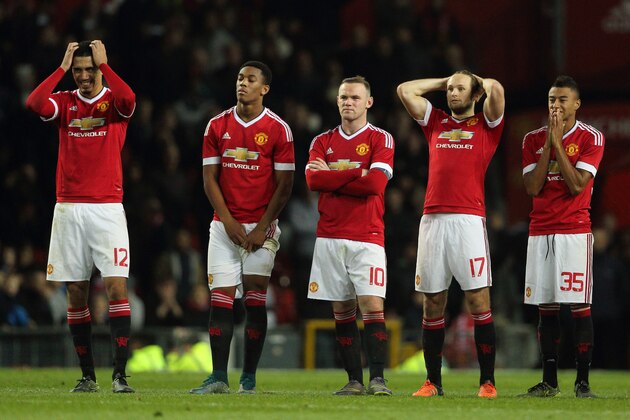 MANCHESTER, UNITED KINGDOM - OCTOBER 28:   Manchester United players react after losing the penalty shoot out in the Capital One Cup Fourth Round match between Manchester United v Middlesbrough at Old Trafford on October 28, 2015 in Manchester, United Kingdom.  (Photo by Matthew Ashton - AMA/Getty Images)