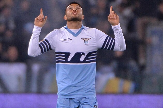 Lazio's Felipe Anderson celebrates after scoring during an Italian Serie A soccer match between Lazio and Hellas Verona, in Rome, Sunday, March 22, 2015. (AP Photo/Maurizio Brambatti, Ansa) ITALY OUT