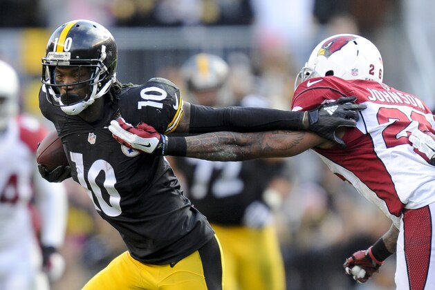 Pittsburgh Steelers wide receiver Martavis Bryant (10) tries to get away from Arizona Cardinals free safety Rashad Johnson (26) after making a catch in the second half of an NFL football game  Sunday, Oct. 18, 2015 in Pittsburgh. The Steelers won 25-13. (AP Photo/Don Wright)