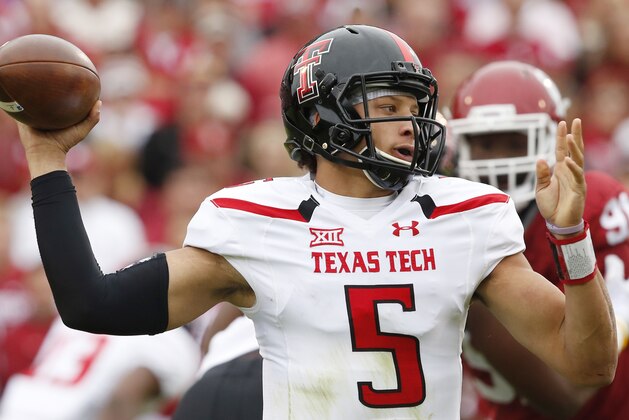 Texas Tech quarterback Patrick Mahomes (5) passes in the first quarter of an NCAA college football game against Oklahoma in Norman, Okla., Saturday, Oct. 24, 2015. (AP Photo/Sue Ogrocki)