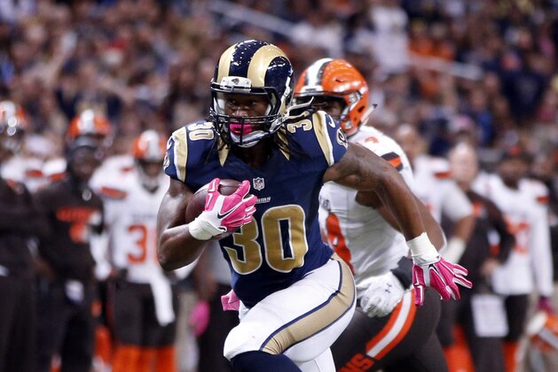 St. Louis Rams running back Todd Gurley heads for the end zone on a 16-yard touchdown run during the fourth quarter of an NFL football game against the Cleveland Browns Sunday, Oct. 25, 2015, in St. Louis. (AP Photo/Billy Hurst)