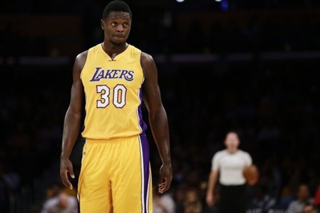 Los Angeles Lakers' Julius Randle looks on during the first half of an NBA preseason basketball game against the Portland Trail Blazers, Monday, Oct. 19, 2015, in Los Angeles. (AP Photo/Jae C. Hong)