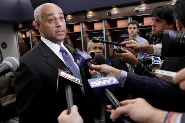 Omar Minaya speaks to the media in the Mets club house Monday, Oct. 4, 2010, at Citi Field in New York. The New York Mets fired manager Jerry Manuel and relieved general manager Omar Minaya of his duties on Monday, an expected shake-up of the big-spending ballclub after it completed its second straight losing season.  (AP Photo/Seth Wenig)