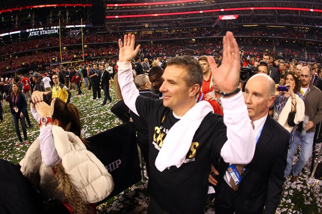 ARLINGTON, TX - JANUARY 12:  Head Coach Urban Meyer of the Ohio State Buckeyes celebrates after defeating the Oregon Ducks 42 to 20 in the College Football Playoff National Championship Game at AT&T Stadium on January 12, 2015 in Arlington, Texas.  (Photo by Jamie Squire/Getty Images)