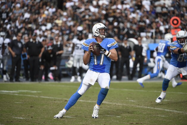 San Diego Chargers quarterback Philip Rivers (17) throws a pass during the second half of an NFL football game against the Oakland Raiders Sunday, Oct. 25, 2015, in San Diego. (AP Photo/Denis Poroy)