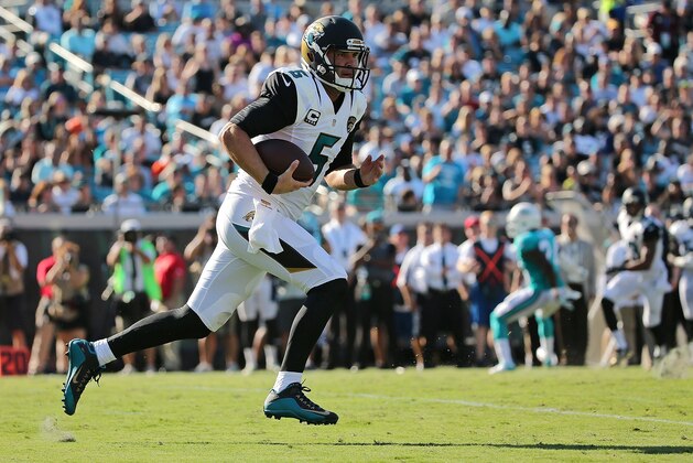 JACKSONVILLE, FL - SEPTEMBER 20:  Blake Bortles #5 of the Jacksonville Jaguars rushes during a game against the Miami Dolphins at EverBank Field on September 20, 2015 in Jacksonville, Florida.  (Photo by Mike Ehrmann/Getty Images)